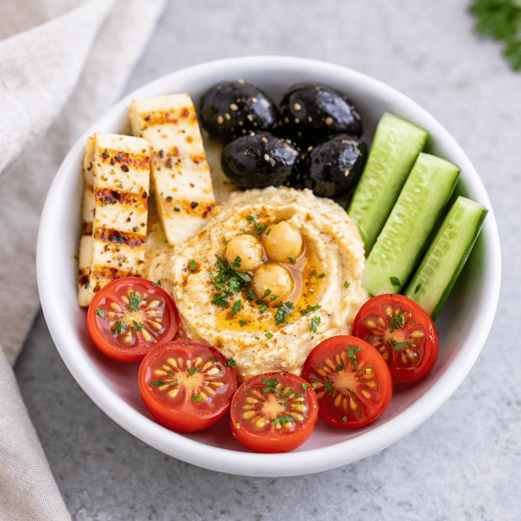 Halloumi Snack (halloumi, black olives, hummus, cherry tomatoes, cucumber)